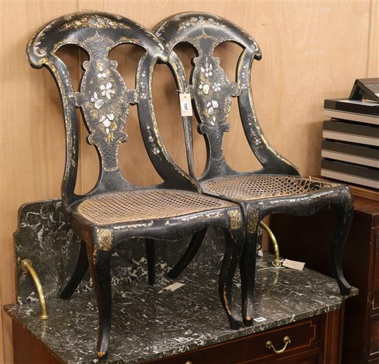 A pair of papier mache seated chairs